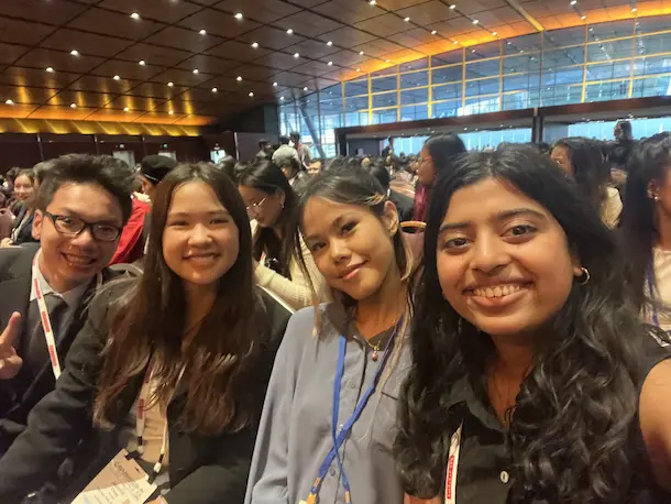 Kyle, Jasmine, Su, and Stef take a picture seated at the SASE National Convention Closing ceremony